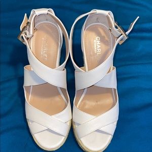 Women’s white size 8 wedge sandals.